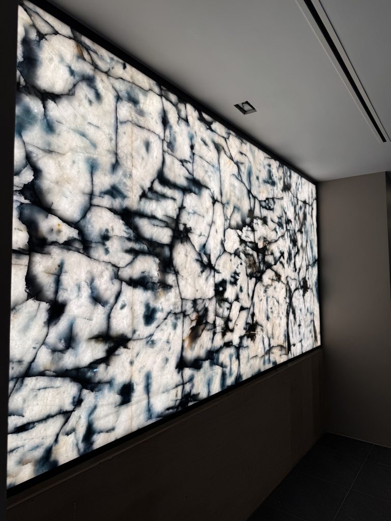 backlit blue ice quartzite feature wall